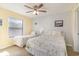 Bright bedroom with two twin beds, perfect for guests or children at 501 Maison Dr. # E20, Myrtle Beach, SC 29572