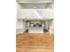 Spacious open-plan living area with a kitchen, laminate floors, and a loft, perfect for entertaining at 4350 Spa Dr. # 506, Little River, SC 29566