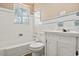 Classic bathroom with white tile, vintage fixtures, and natural light at 512 W Baptist St., Marion, SC 29571