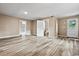 Open bathroom with toilet and wood-look floors at 512 W Baptist St., Marion, SC 29571