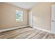 Cozy bedroom featuring a closet, a window, and modern flooring at 512 W Baptist St., Marion, SC 29571