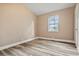 Cozy bedroom features natural light and modern flooring at 512 W Baptist St., Marion, SC 29571
