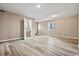 Open bedroom with wood-look floors and neutral walls at 512 W Baptist St., Marion, SC 29571