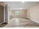 Open bedroom with wood-look floors and neutral walls for a cozy feel at 512 W Baptist St., Marion, SC 29571