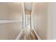 Bright hallway featuring modern flooring and neutral wall paint at 512 W Baptist St., Marion, SC 29571