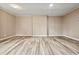 Open-concept living room with wood-look floors and recessed lighting at 512 W Baptist St., Marion, SC 29571