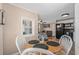 The dining area with a wooden table flows seamlessly into the living room and kitchen at 6001 - N84 S Kings Hwy., Myrtle Beach, SC 29575