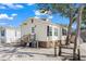 Charming one-story home with an elevated front porch and white siding at 6001 - N84 S Kings Hwy., Myrtle Beach, SC 29575