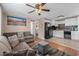 Comfortable living room flowing into a kitchen with a breakfast bar and stainless steel appliances at 6001 - N84 S Kings Hwy., Myrtle Beach, SC 29575