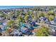 Real estate aerial view of a residential neighborhood near the ocean with a blue and a gray home at 6001-O32 S Kings Hwy., Myrtle Beach, SC 29575