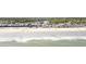 Beautiful beach with a view of the ocean and nearby homes and condos in the neighborhood at 6001-O32 S Kings Hwy., Myrtle Beach, SC 29575
