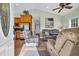 Inviting living room and kitchen with tile flooring, comfortable seating, and plenty of natural light at 6001-O32 S Kings Hwy., Myrtle Beach, SC 29575