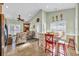 Comfortable living room with eat in kitchen, vaulted ceiling, and plenty of natural light at 6001-O32 S Kings Hwy., Myrtle Beach, SC 29575