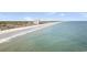 Expansive ocean view from the sky with a sandy beach, blue water, and nearby condo buildings at 6001-O32 S Kings Hwy., Myrtle Beach, SC 29575