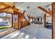 Large covered outdoor space with wooden beams, an outdoor shower, and a seating area; perfect for relaxing and entertaining at 6001-O32 S Kings Hwy., Myrtle Beach, SC 29575