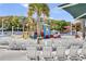 Gathering-friendly waterpark with several lounge chairs, colorful slides, and splash zone at 6001-O32 S Kings Hwy., Myrtle Beach, SC 29575