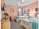 Inviting bedroom with twin beds, ceiling fan, and nautical accents, perfect for guests or Gathering at 602 Waterway Village Blvd. # 30-F, Myrtle Beach, SC 29579