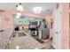 Updated kitchen featuring granite countertops, stainless steel appliances, and marine-themed cabinet art at 602 Waterway Village Blvd. # 30-F, Myrtle Beach, SC 29579