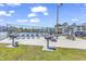 Community tennis court with shaded seating areas, offering a recreational space for residents and guests at 602 Waterway Village Blvd. # 30-F, Myrtle Beach, SC 29579