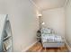 Simple bedroom with a lounger, a boat shelf, and wood floors at 613 Calhoun Dr., Murrells Inlet, SC 29576