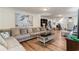 Bright and airy living room with a comfortable sectional and stylish decor at 613 Calhoun Dr., Murrells Inlet, SC 29576
