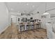 Modern kitchen with granite counters, stainless steel appliances and seating at the island at 617 Cherry Blossom Dr., Murrells Inlet, SC 29576