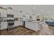 Open concept kitchen featuring stainless appliances, granite countertops, and an island at 617 Cherry Blossom Dr., Murrells Inlet, SC 29576