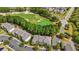 Scenic aerial view of the golf course and condominiums surrounded by mature trees at 6253 Catalina Dr. # 921, North Myrtle Beach, SC 29582