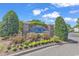 Welcoming community entrance with manicured landscaping and a prominent signage at 6253 Catalina Dr. # 921, North Myrtle Beach, SC 29582