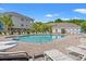 Relaxing community pool area with lounge chairs and lush landscaping at 6253 Catalina Dr. # 921, North Myrtle Beach, SC 29582
