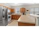 Well-lit kitchen featuring stainless steel appliances and ample cabinet space with tile flooring at 6253 Catalina Dr. # 921, North Myrtle Beach, SC 29582