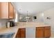 Kitchen featuring a breakfast bar counter which overlooks the bright living area at 6253 Catalina Dr. # 921, North Myrtle Beach, SC 29582