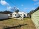 Lush backyard with patio area, showcasing outdoor living and green space near the home at 632 Magnolia Dr., Georgetown, SC 29440