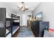 Shared bedroom featuring a bunk bed, single bed, and vintage dresser on hardwood floors at 632 Magnolia Dr., Georgetown, SC 29440