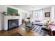 Bright living room with a fireplace, stylish furnishings, and ample natural light at 632 Magnolia Dr., Georgetown, SC 29440