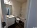 Bathroom with sink, toilet, and bath tub at 645 Castillo Dr., Loris, SC 29569