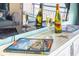 Balcony view with decorative bottles and welcome guide at 6804 N Ocean Blvd. # 631, Myrtle Beach, SC 29572