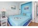 Inviting bedroom with a comfortable bed, ocean-themed decor, and soft lighting at 6804 N Ocean Blvd. # 631, Myrtle Beach, SC 29572