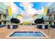 Relaxing hot tub surrounded by lounge chairs and greenery at 6804 N Ocean Blvd. # 631, Myrtle Beach, SC 29572