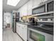 Well-equipped kitchen features stainless steel appliances and white cabinetry at 6804 N Ocean Blvd. # 631, Myrtle Beach, SC 29572