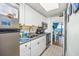 Galley kitchen features stainless appliances and open access to the dining area and ocean views at 6804 N Ocean Blvd. # 631, Myrtle Beach, SC 29572