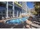 Scenic pool with a bridge surrounded by beach chairs and tropical views, ideal for relaxation and enjoyment at 6804 N Ocean Blvd. # 631, Myrtle Beach, SC 29572