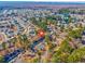 A bird's eye view of a neighborhood with diverse amenities, including community recreation areas and waterfront access at 6839 Blue Heron Blvd. # 105, Myrtle Beach, SC 29588