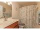 Functional bathroom offers a combination of style and accessibility, featuring grab bars and updated fixtures at 724 Alexis Dr., Longs, SC 29568