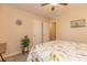 A cozy bedroom with neutral walls and a floral patterned bedspread to create a serene space at 724 Alexis Dr., Longs, SC 29568