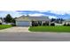 Charming single story home with a well manicured front lawn and attached garage at 724 Alexis Dr., Longs, SC 29568