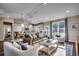Bright and airy living room with plush seating, hardwood floors, and contemporary decor at 8655 Farrier Dr., Myrtle Beach, SC 29588