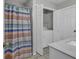 Bathroom with a washer/dryer located in the closet near the vanity with white countertops at 912 Tiffany Ln., North Myrtle Beach, SC 29582