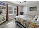 Bedroom with wood flooring, a large window, and coastal-themed decor at 912 Tiffany Ln., North Myrtle Beach, SC 29582