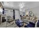 Open-concept living room featuring neutral walls, fireplace, and bright natural light at 912 Tiffany Ln., North Myrtle Beach, SC 29582